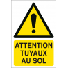 Attention tuyaux au sol