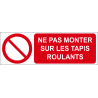 Ne pas monter sur les tapis roulants